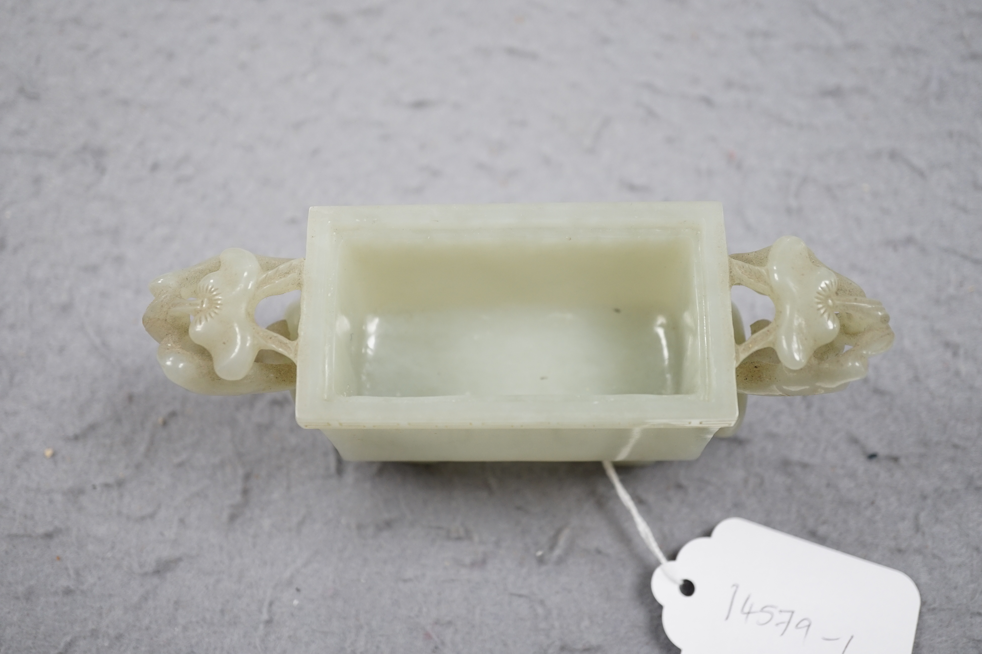 A Chinese pale celadon jade rectangular vase and cover, 19th/20th century
